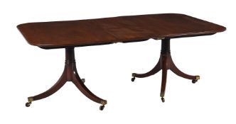 A George III mahogany twin pedestal dining table