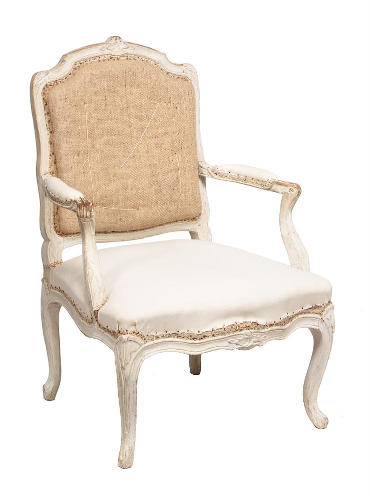 A French white painted armchair in Louis XV style