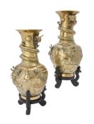 A pair of Chinese brass 'dragon' vases