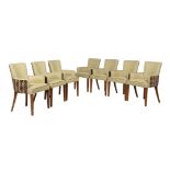 A set of fourteen beech and upholstered armchairs