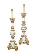 A pair of blue painted and parcel giltwood lamps