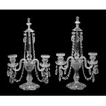 A pair of Edwardian cut glass table candelabra