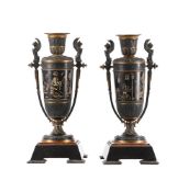 A pair of Egyptian Revival urns