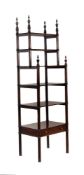 An early Victorian mahogany six tier whatnot