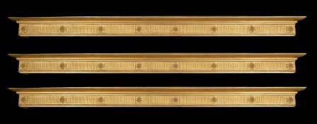 A set of three giltwood curtain pelmets, in George III style