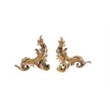 A pair of French gilt bronze chenets in Louis XV style