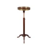 A Louis Philippe mahogany and 'plum pudding' mahogany tripod table