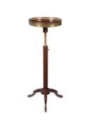 A Louis Philippe mahogany and 'plum pudding' mahogany tripod table