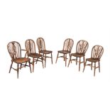 A set of six ash and elm wheel back Windsor chairs