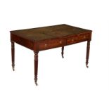 A Regency mahogany and ebony strung library or writing table