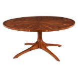 A yew circular dining table