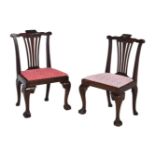 A pair of mahogany low side chairs