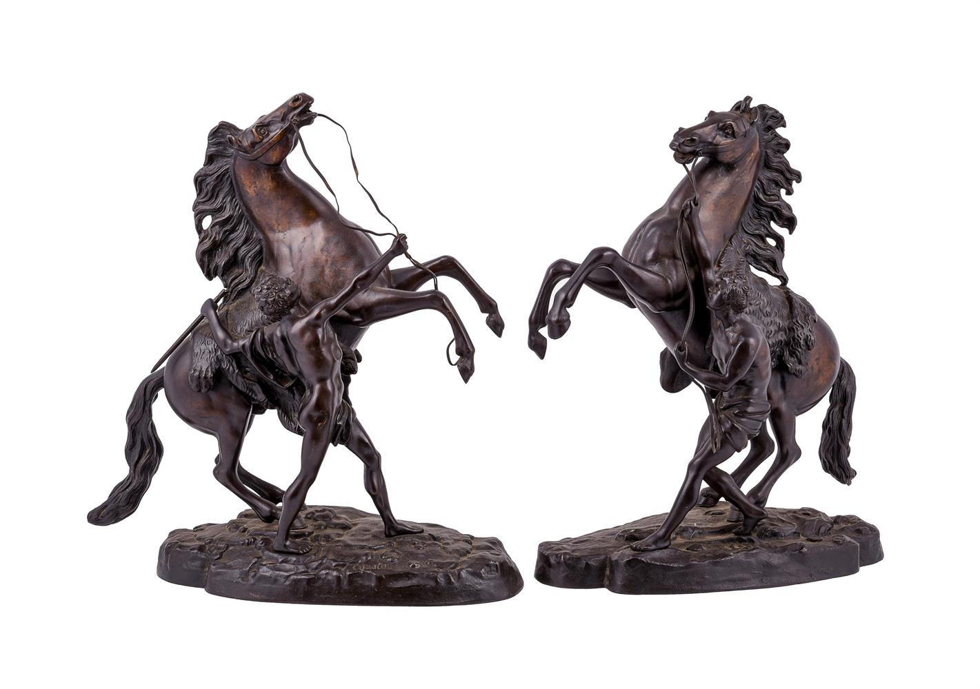 A pair of patinated Marly horses