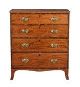 A George III mahogany and goncalo alves crossbanded chest of drawers