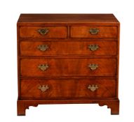 A walnut caddy top chest in George I style by Arthur Brett & Sons Norwich