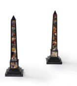 A pair of specimen marble inlaid obelisks