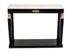 An ebonised and gilt metal mounted console table