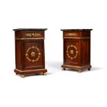 A pair of French mahogany and giltmetal mounted bedside cabinets