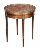 A French mahogany and brass inlaid occasional table in Directoire style