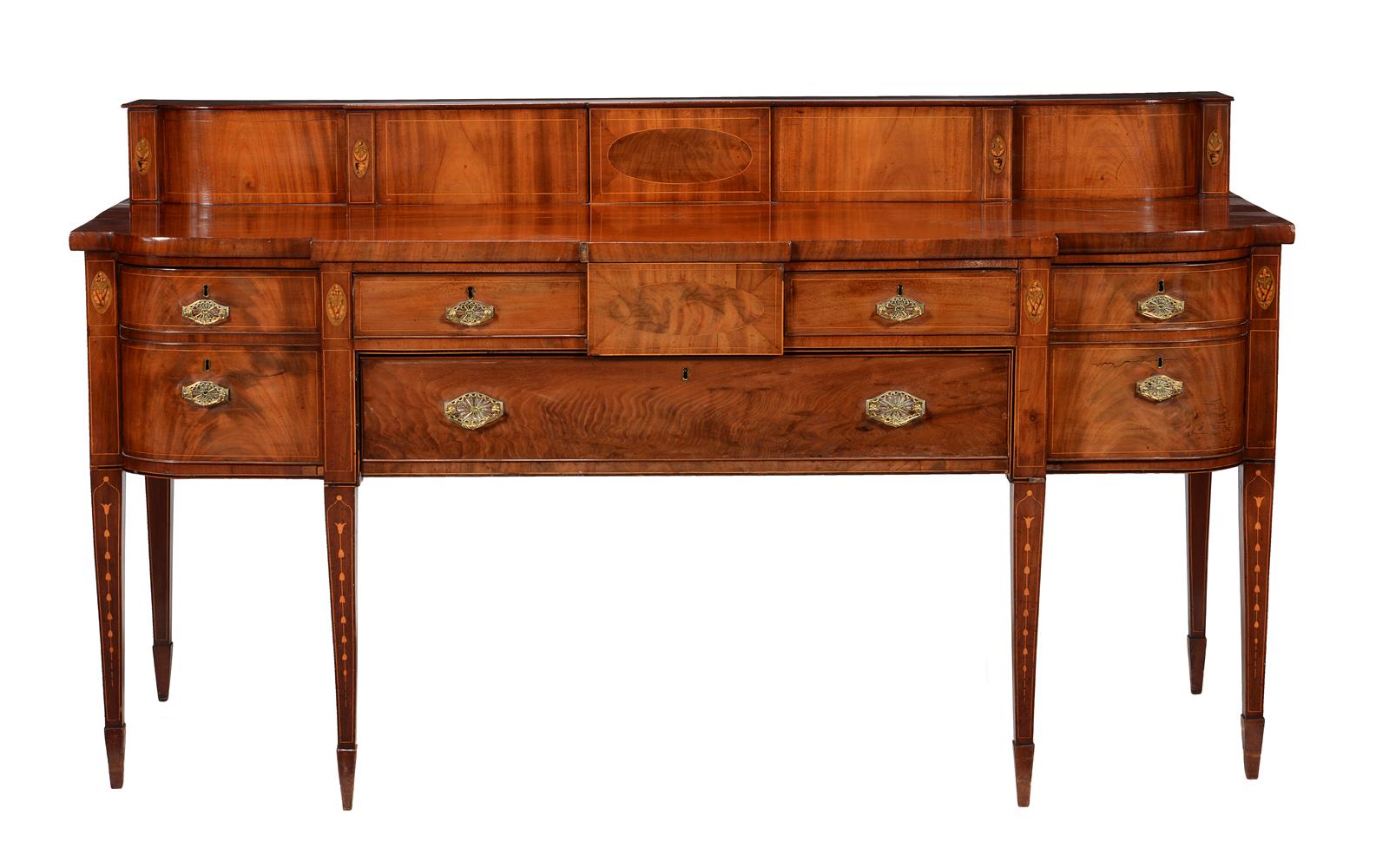 A George III mahogany and inlaid sideboard