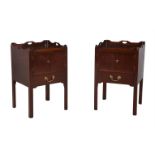 A pair of mahogany bedside tables in George III style