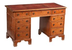 A mahogany pedestal desk