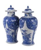 Two Chinese 'Shipwreck' blue and white vases and covers