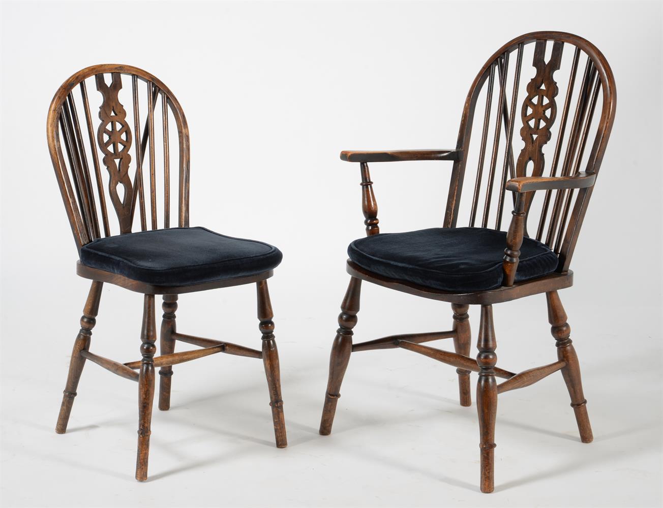 A set of eight beech and elm wheel back dining chairs - Image 3 of 4