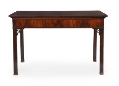 A GEORGE III MAHOGANY SIDE TABLE, IN THE MANNER OF THOMAS CHIPPENDALE, CIRCA 1765