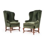 A PAIR OF WALNUT AND UPHOLSTERED WING ARMCHAIRS, IN WILLIAM & MARY STYLE