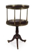 A GEORGE IV MAHOGANY TWO TIER DUMB WAITER, IN THE MANNER OF GILLOWS, CIRCA 1825