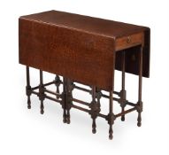 A GEORGE III FUSTIC MAHOGANY AND MAHOGANY 'SPIDER' GATE-LEG TABLE, SECOND HALF 18TH CENTURY