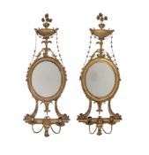 A PAIR OF CARVED GILTWOOD GIRANDOLE WALL MIRRORS, IN GEORGE III STYLE, 19TH CENTURY
