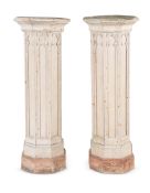 A PAIR OF CREAM PAINTED COLUMNAR PEDESTALS, IN THE GOTHIC TASTE, 19TH CENTURY