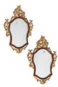 A PAIR OF ITALIAN GILTWOOD AND RED PAINTED WALL MIRRORS, CIRCA 1770