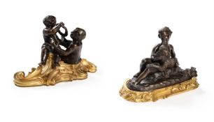 TWO 18TH CENTURY FRENCH PATINATED AND GILT BRONZE PRESSE-PAPIERS, CIRCA 1780