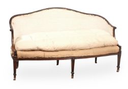 A GEORGE III MAHOGANY SETTEE, IN THE MANNER OF INCE & MAYHEW, CIRCA 1775