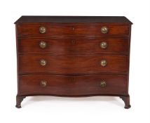 A GEORGE III MAHOGANY SERPENTINE FRONTED CHEST OF DRAWERS OR COMMODE, CIRCA 1800