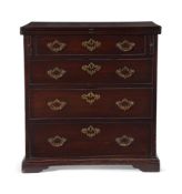 AN GEORGE II MAHOGANY BACHELOR'S CHEST OF DRAWERS, CIRCA 1755