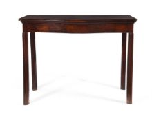 A GEORGE III MAHOGANY SERPENTINE FRONTED SIDE OR HALL TABLE, IN THE MANNER OF THOMAS CHIPPENDALE
