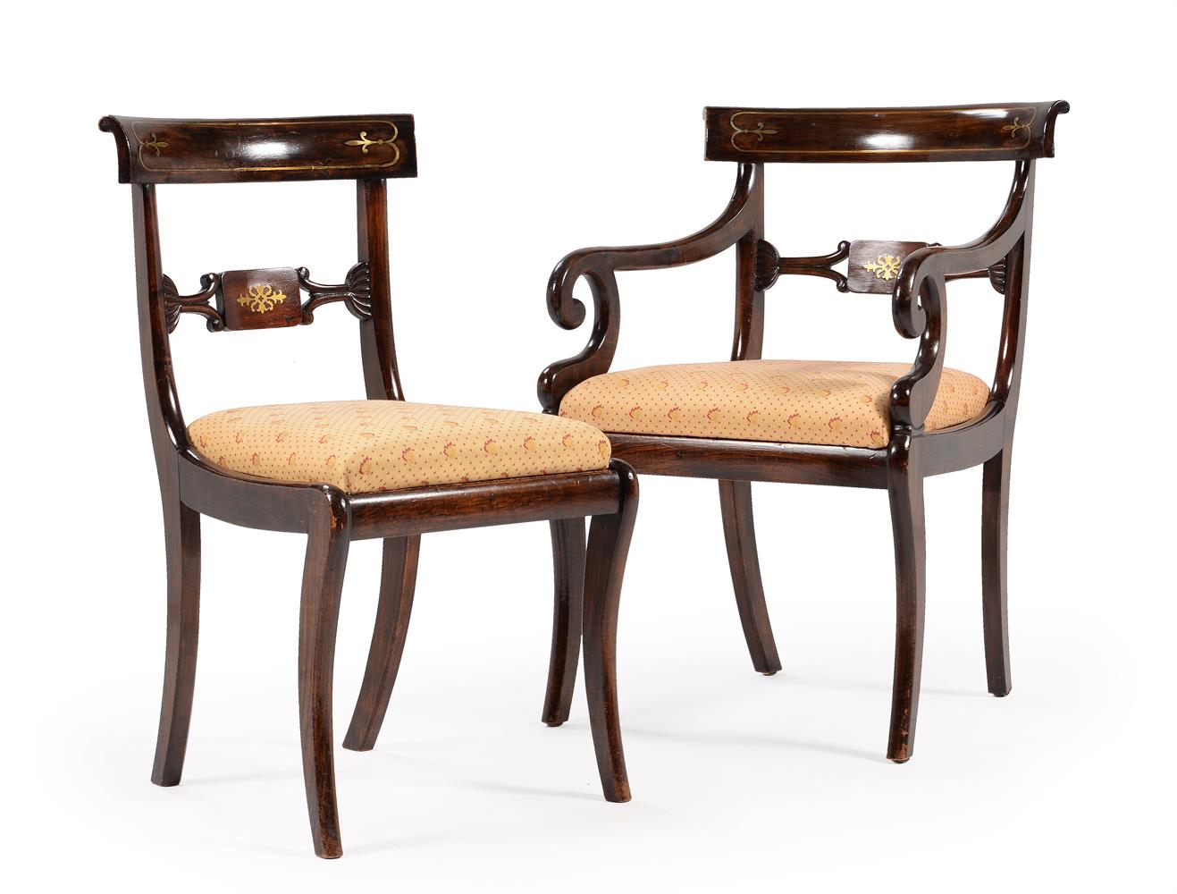 A SET OF FOURTEEN REGENCY SIMULATED ROSEWOOD AND BRASS INLAID DINING CHAIRS, CIRCA 1815