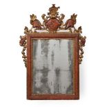 AN ITALIAN GILTWOOD AND RED LACQUER WALL MIRROR, PROBABLY VENETIAN