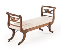 A REGENCY MAHOGANY AND UPHOLSTERED WINDOW SEAT, CIRCA 1820