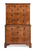 A GEORGE II WALNUT AND CROSSBANDED CHEST ON CHEST, CIRCA 1735