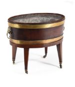 A GEORGE III MAHOGANY AND BRASS BOUND WINE COOLER, CIRCA 1805