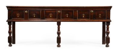 A CHARLES II OAK DRESSER BASE, CIRCA 1670