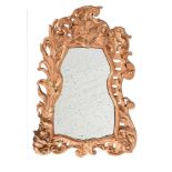 A CONTINENTAL CARVED GILTWOOD WALL MIRROR, POSSIBLY SPANISH OR PORTUGUESE