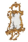 A CARVED GILTWOOD WALL MIRROR, IN GEORGE III STYLE, 19TH CENTURY