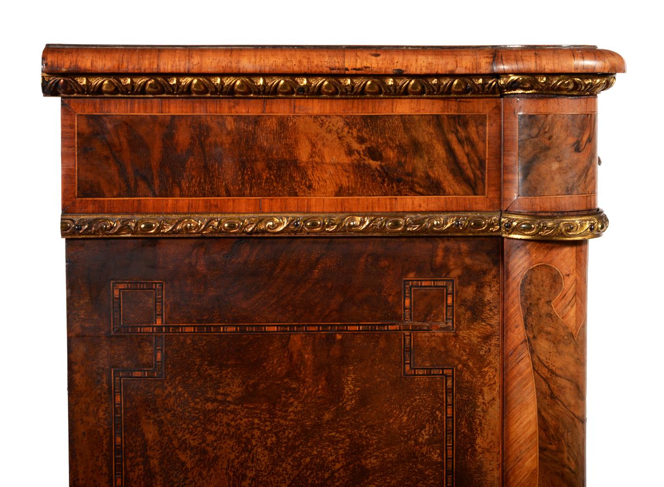 A PAIR OF VICTORIAN FIGURED WALNUT, WALNUT CROSSBANDED AND GILT METAL MOUNTED BOOKCASES - Image 6 of 7