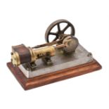 A small well engineered model of a horizontal live steam mill engine